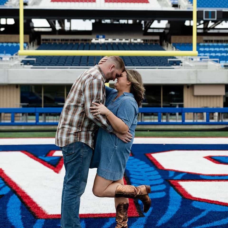 Woman in engagement photo with natural-looking spray tan by Sunny Daze Sunless in Lawrence, Kansas