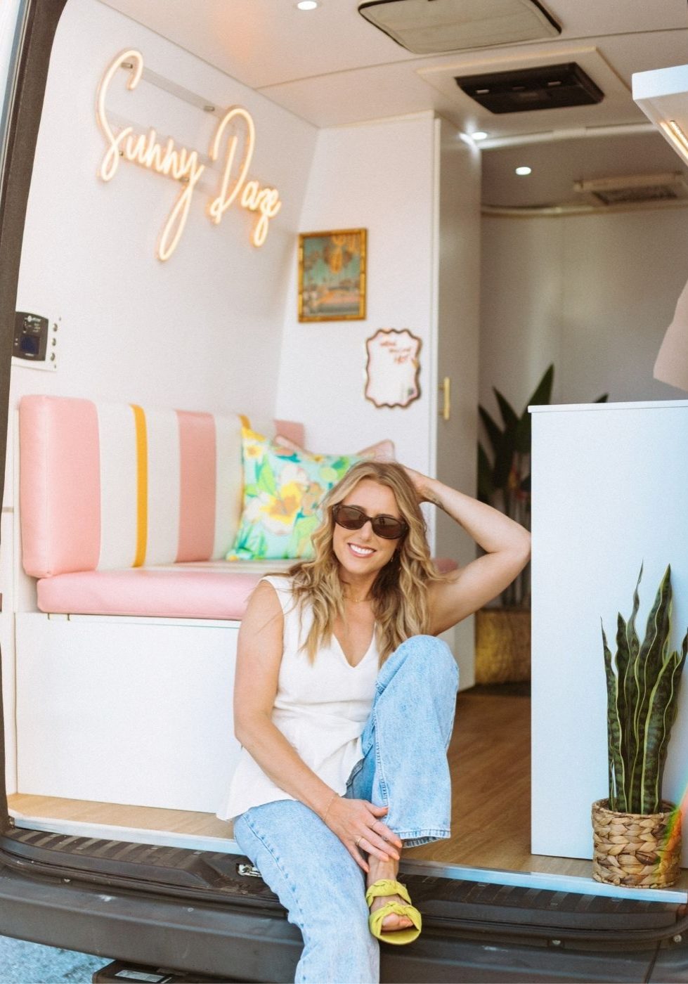 Ashley Bird inside Gerdy the Glow Mobile Spray tan van - mobile spray tanning serving Lawrence and Johnson County KS