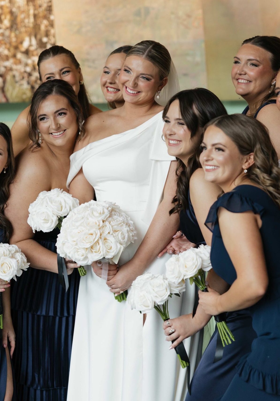 Bridal party with matching golden spray tans by Sunny Daze Sunless mobile group spray tan service in Prairie Village, Kansas.